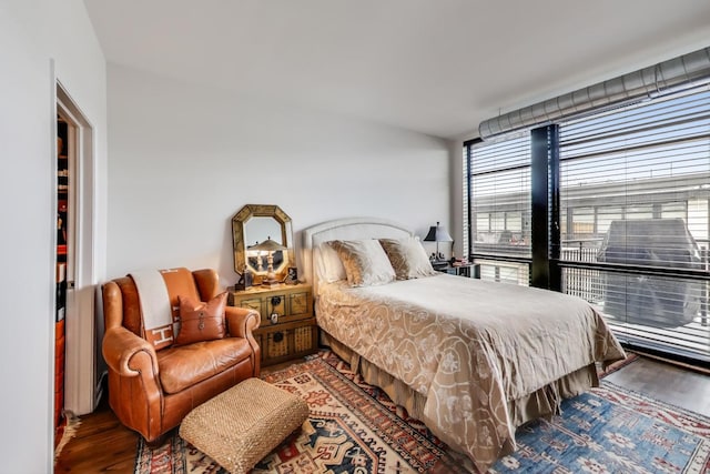 bedroom with wood finished floors