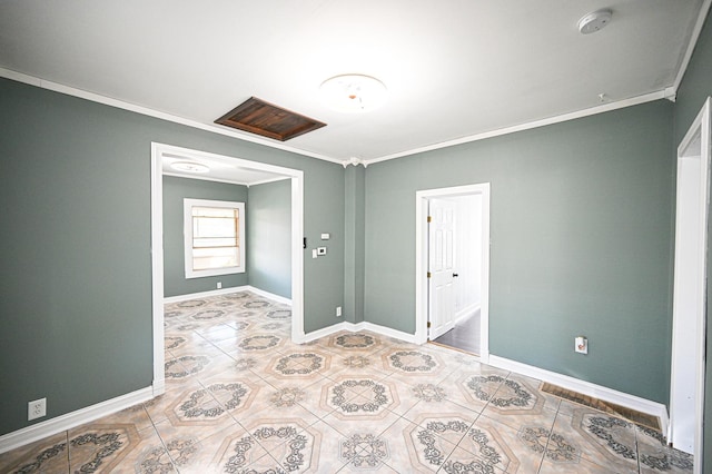 tiled spare room with ornamental molding