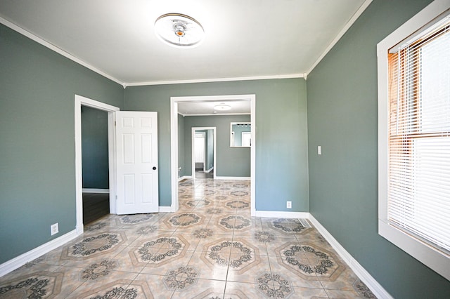 unfurnished bedroom with light tile patterned floors and crown molding