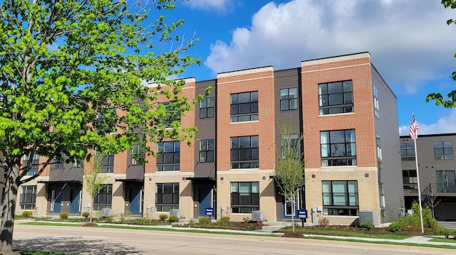 view of property featuring central AC unit