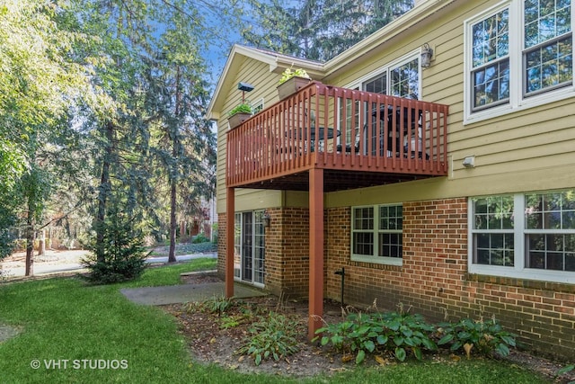 view of home's exterior featuring a deck