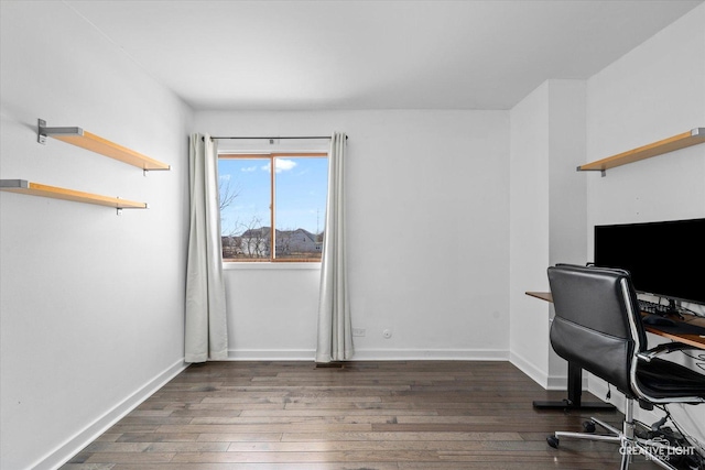 home office featuring hardwood / wood-style flooring and baseboards