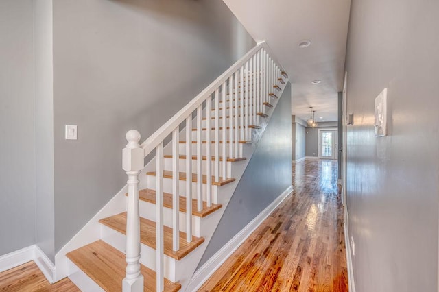 stairway with wood-type flooring