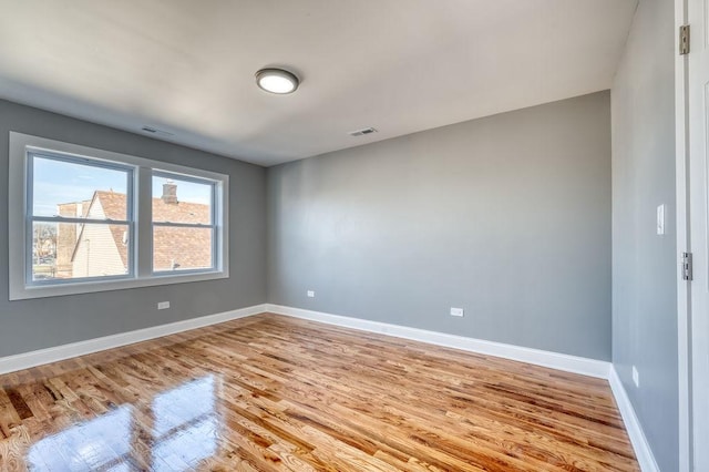 empty room with light wood-type flooring