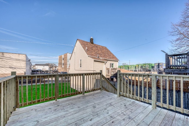 deck featuring a lawn