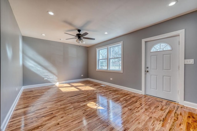 foyer entrance featuring ceiling fan and light hardwood / wood-style floors