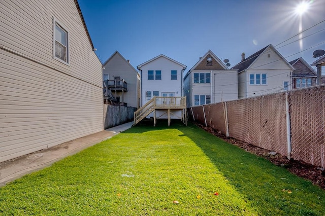 view of yard featuring a deck