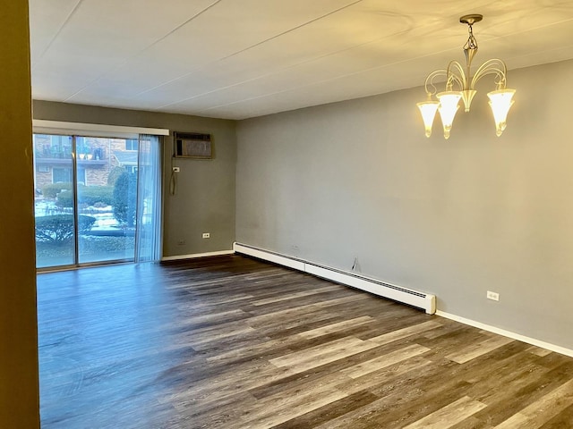 unfurnished room featuring a notable chandelier, a wall mounted air conditioner, dark hardwood / wood-style flooring, and a baseboard heating unit