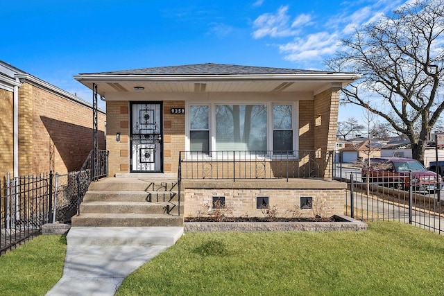 view of front of house with a front lawn