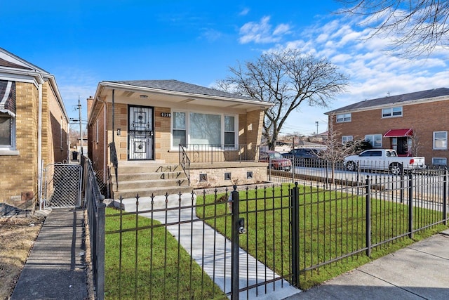 view of front of home with a front yard and a porch