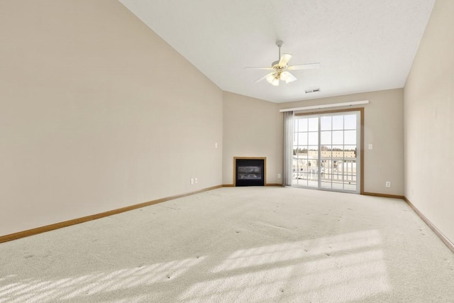 unfurnished living room featuring light colored carpet and ceiling fan