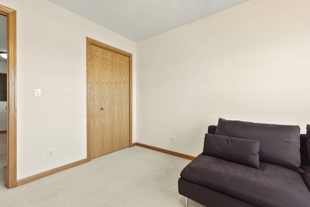 living area with carpet floors