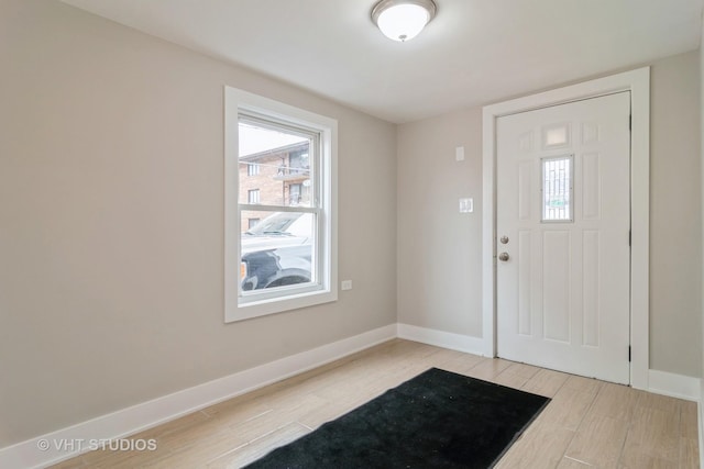 foyer entrance featuring light wood-type flooring