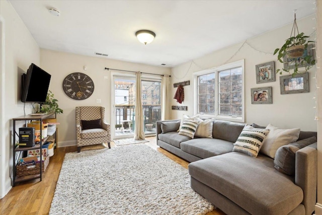 living room featuring light wood-type flooring