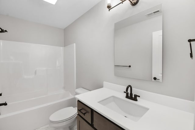 full bathroom featuring vanity,  shower combination, and toilet