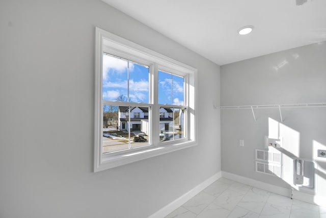 washroom featuring hookup for an electric dryer