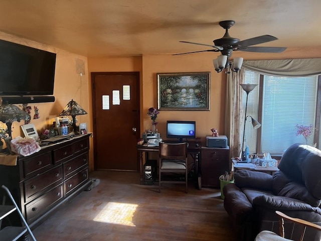 living room with dark hardwood / wood-style flooring and ceiling fan