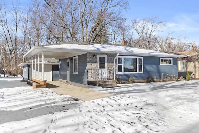 ranch-style home featuring a garage