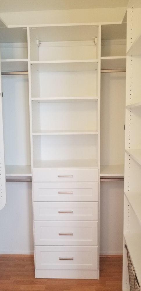 walk in closet with wood-type flooring