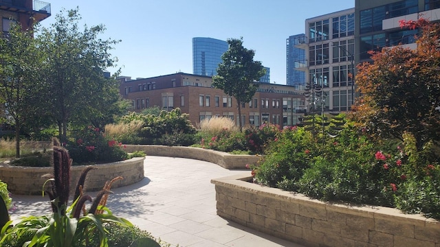 surrounding community featuring a patio area