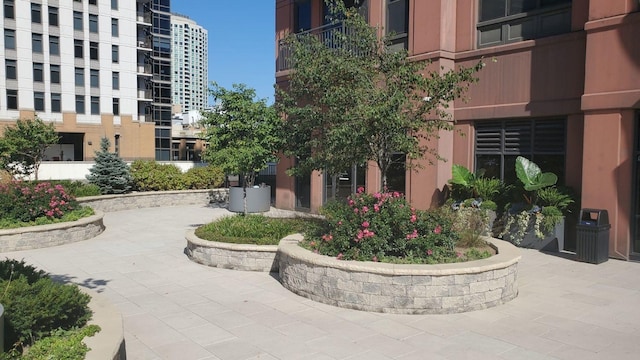 view of home's community featuring a patio area