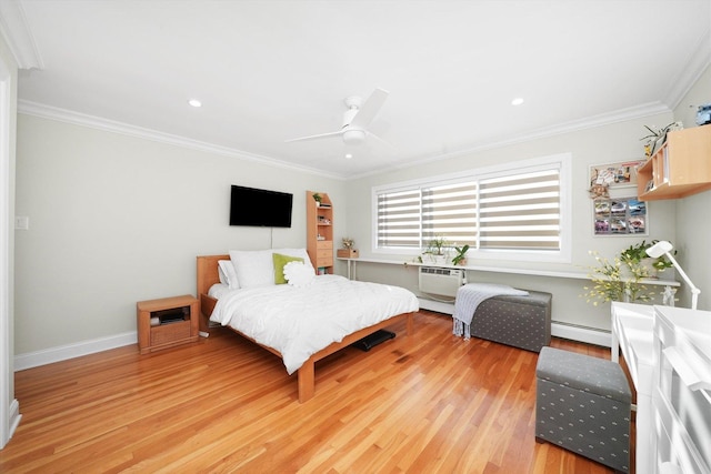 bedroom featuring crown molding, an AC wall unit, baseboard heating, light wood-type flooring, and ceiling fan