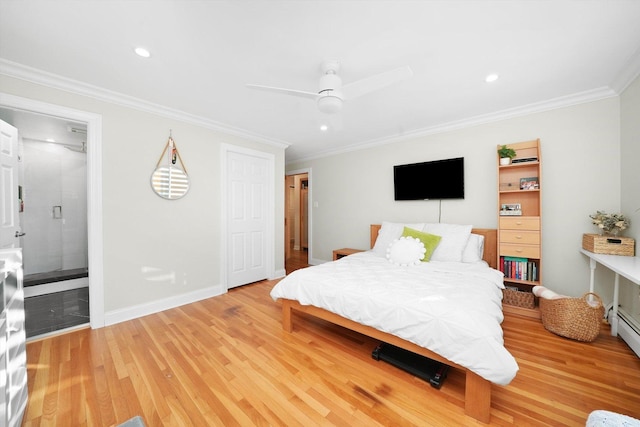 bedroom featuring crown molding, ceiling fan, ensuite bath, and light hardwood / wood-style flooring