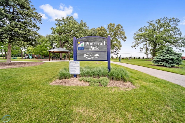 surrounding community featuring a gazebo and a yard