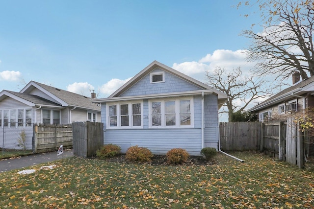 view of home's exterior with a yard