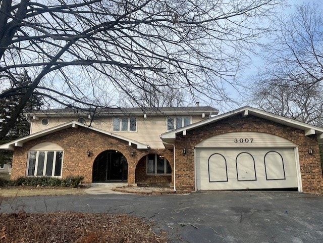 view of front of property featuring a garage