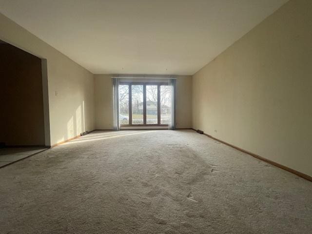 empty room featuring carpet floors