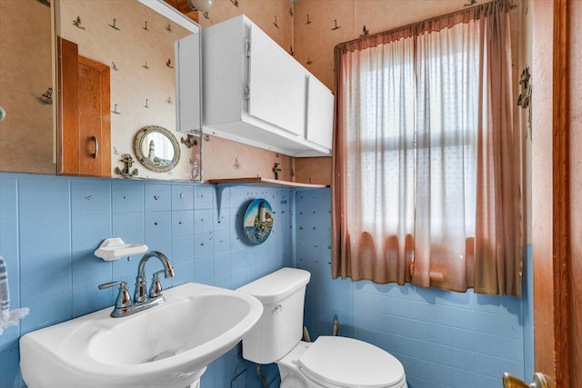 bathroom with toilet and sink