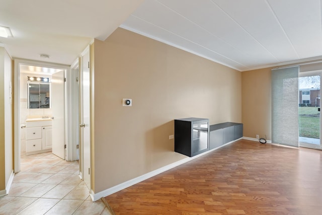 interior space with hookup for an electric dryer and light wood-type flooring