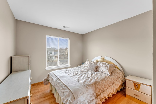 bedroom featuring light hardwood / wood-style flooring