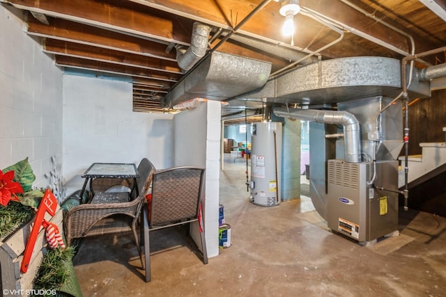 basement featuring gas water heater and heating unit