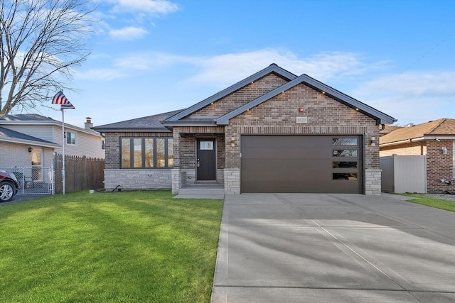 view of front of house with a garage and a front yard