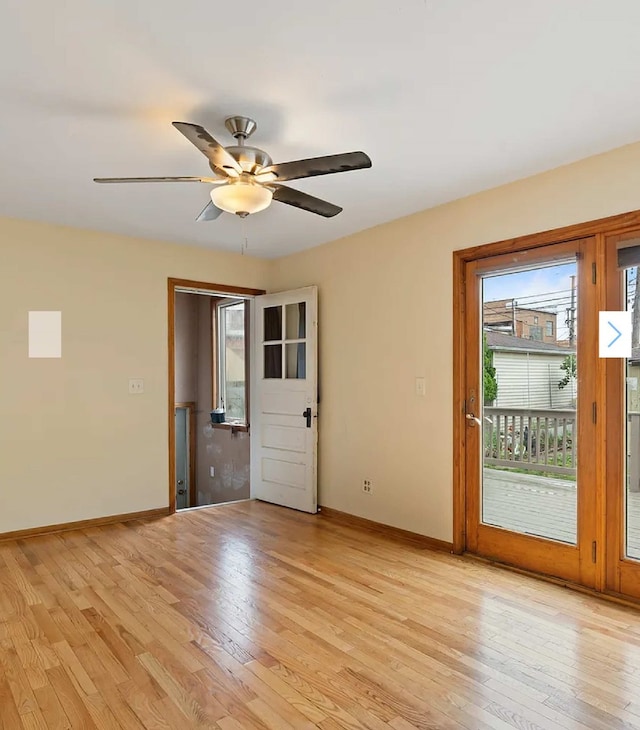 unfurnished room featuring ceiling fan and light hardwood / wood-style flooring