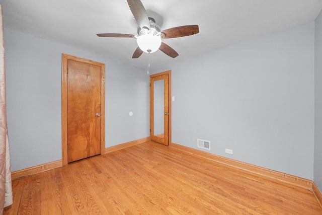 unfurnished bedroom featuring ceiling fan and light wood-type flooring