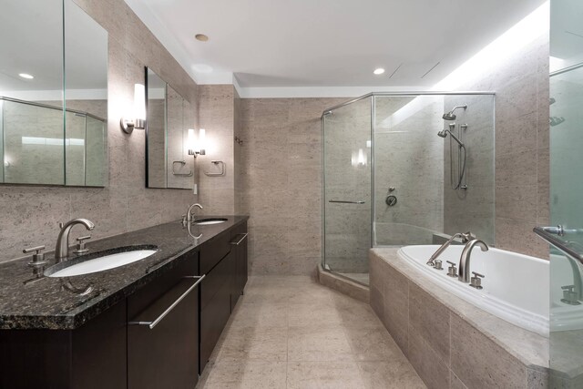 full bathroom with vanity, toilet, and tiled shower / bath