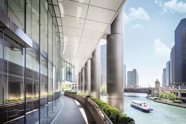 exterior space featuring a water view and a view of city