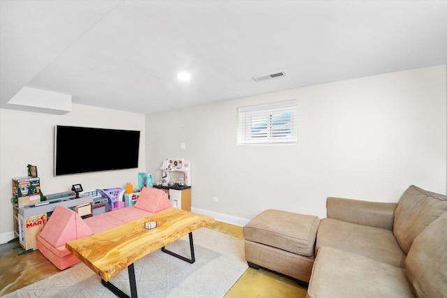 living room with concrete flooring