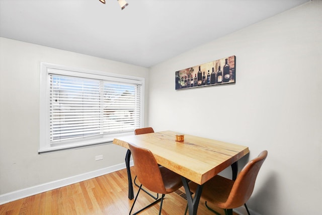 dining area with light wood-type flooring