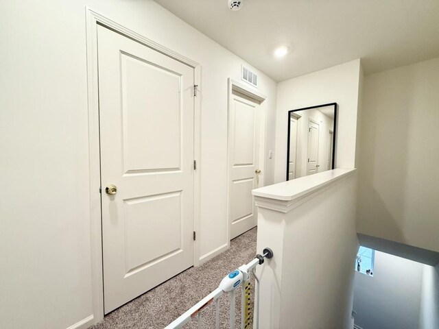 bathroom featuring hardwood / wood-style flooring and toilet