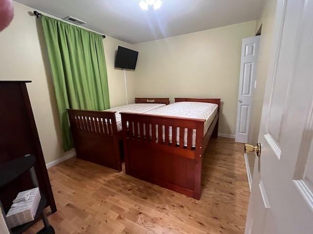 bedroom featuring light hardwood / wood-style flooring