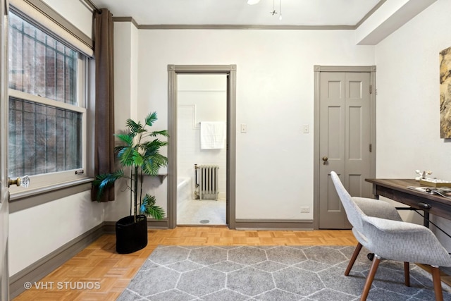 office area with ornamental molding, radiator, and light parquet floors