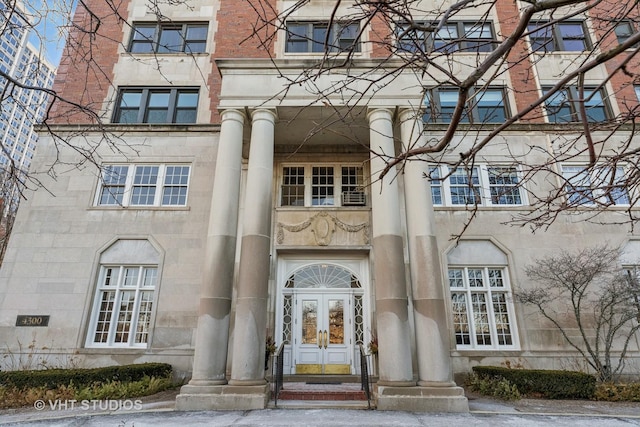 entrance to property featuring french doors