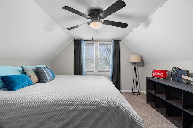 bedroom featuring vaulted ceiling, carpet, and ceiling fan