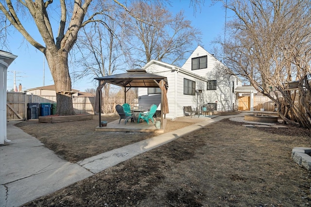 exterior space with a gazebo and a patio area