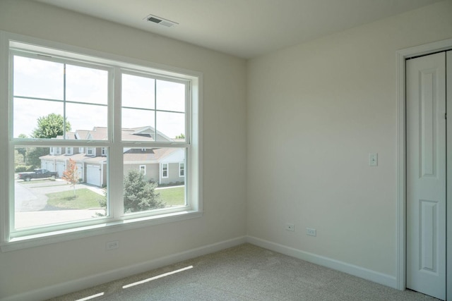 empty room with light carpet