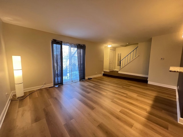 spare room featuring hardwood / wood-style floors